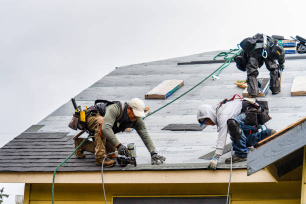 Professional Gutter Installation technician working in Quilcene, WA